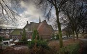 Het kerkgebouw van de gereformeerde gemeente in Nederland te Gouda (Stationsplein). beeld RD, Henk Visscher