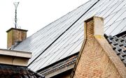 Meer dan een kwart van de kerken heeft zonnepanelen op het dak liggen. beeld ANP, Koen van Weel