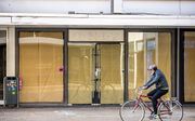 Een lege winkelstraat in Heerlen. Door de impact van de coronacrisis is er veel leegstand in verschillende steden. beeld ANP, Marcel van Hoorn