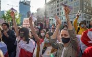 Polen protesteren tegen de gevangenneming van Protasevitsj. beeld AFP, Wojtek RADWANSKI