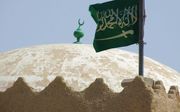 ”Er is geen god dan Allah en Mohammed is zijn boodschapper”, vermeldt de vlag van Saudi-Arabië. beeld Jacob Hoekman