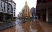 Lege straten tijdens een landelijke covid-19 lockdown in Wellington, Nieuw-Zeeland. beeld AFP, Marty MELVILLE