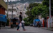 Straatbeeld (donderdag) in de hoofdstad van Haïti, Port-au-Prince. beeld AFP, Ricardo Arduengo
