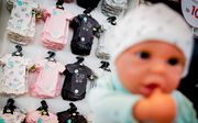Babyartikelen op de Negenmaandenbeurs in Amsterdam. Studies wijzen erop dat vaccinatie tijdens de zwangerschap niet leidt tot meer miskramen. beeld ANP, Remko de Waal