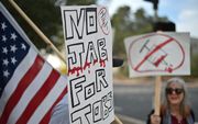 Protest tegen verplichte vaccinatie voor bepaalde beroepsgroepen in Pasadena, Californië, november 2021. beeld AFP, Robyn Beck