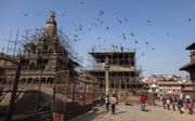 Hindoetempels op het Patan Durbar-plein in Lalitpur in Nepal stortten in tijdens de aardbeving van 2015. Inmiddels worden de gebouwen gerestaureerd. Het hindoeïsme is de grootste godsdienst in Nepal. beeld EPA, Hemanta Shrestha