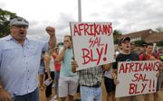 Afrikaanstalige studenten demonsteren voor het gebruik van de taal van hun keuze aan de Universiteit van Pretoria, februari 2016. De Economic Freedom Fighters, een radicale afsplitsing van het ANC, bepleitten juist de algehele afschaffing van het Afrikaan
