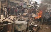 Medewerkers van de HVC-partnerorganisatie in Pakistan schoten in 2013 te hulp toen huizen van christenen in Lahore in brand werden gestoken. beeld HVC
