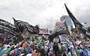 Moslims protesteerden in februari tegen de christelijke gouverneur Ahok van Jakarta. beeld AFP, Adek Berry
