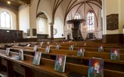 De hervormde gemeente van Scherpenzeel schafte voldoende exemplaren van ”Weerklank” aan om in de kerkbanken te leggen. beeld RD, Anton Dommerholt