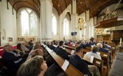 In de Grote Kerk in Vianen luisterden belangstellenden zaterdag naar een lezing over het mensbeeld bij Luther. beeld Jaco Klamer
