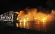 Brand in een jachthaven in het Limburgse Wessem. beeld ANP, Ginopress