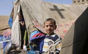 Christenen sloegen de afgelopen jaren massaal op de vlucht voor IS. Foto: een jongen in een kamp in de Koerdische stad Erbil. beeld Open Doors