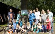 Enkele deelnemers aan een gratis vakantieweek van stichting Weekje Weg voor (eenouder)gezinnen die krap bij kas zitten, in 2015. beeld RD, Henk Visscher