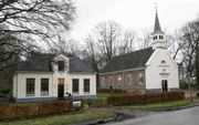 Koloniekerk en pastorie in Wilhelminaoord. beeld RD, Anton Dommerholt