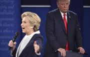 Clinton (l.) en Trump. beeld AFP