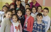 Gevorg en Naira Babayan bezoeken kwetsbare kinderen in Armenië. beeld fam. Babayan