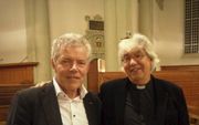 Ds. Paul Visser (l.) en ds. Rob Visser (r.) debateerden woensdag over de positie van de kerken in Amsterdam.  beeld RD