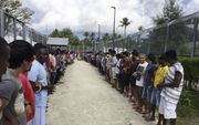 „Het tegengaan van migratie wordt een heet hangijzer bij ontwikkelingssamenwerking, maar biedt kansen voor religieuze hulporganisaties.” Foto: vluchtelingen op Papoea-Nieuw-Guinea. beeld EPA, Hass Hassaballa