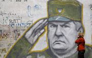In Den Haag heette Ratko Mladic de ”slager van de Balkan”, maar in Belgrado was hij op de dag van zijn arrestatie in mei 2011 nog altijd razend populair. beeld Reuters, Stoyan Nenov