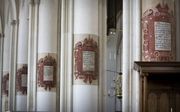 De geloofsbelijdenis op de pilaren van de Martinikerk te Doesburg. beeld RD, Henk Visscher
