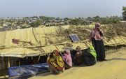Rohingya vluchtelingen uit Myanmar in een provisorisch opgezet kamp in Bangladesh. Beide landen sloten deze een akkoord over de terugkeer van de honderdduizenden ontheemden. beeld Munir Uz Zaman