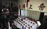 Kerstdienst in een Chinese kerk. beeld AFP