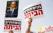 Niet iedereen wil dat ‘crime minister’ Netanyahu aanblijft.  beeld AFP, Jack Guez