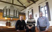 Chris Versprille, Piet Moens en Herman Jansen (v.l.n.r.), de organisten van de gereformeerde gemeente te Marknesse. beeld RD, Anton Dommerholt