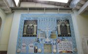 Wandkleed in de synagoge van Buchara. De ooit bloeiende Joodse gemeenschap in Oezbekistan is bezig af te brokkelen. beeld William Immink