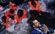 De Italiaanse minister van Binnenlandse Zaken, Matteo Salvini, tijdens een talkshow op televisie over migranten op 20 juni. beeld AFP, Andreas Solaro