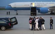 Aankomst vanuit Arizona in Washington.  beeld AFP, Saul Loeb
