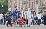 „De vereenzelviging van christenen met de Nederlandse cultuur is soms zo groot, dat ze op hun hoede zijn voor alles wat tegen die cultuur opkomt, zoals migranten.” beeld iStock