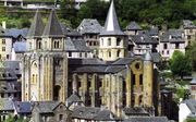 De impact van de kerk was op de samenleving was de eeuwen door groot. Foto: de kerk van Sainte-Foy in het Franse Conques. beeld Wikimedia