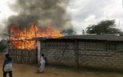 Een christelijke kerk in de Indiase deelstaat Tamil Nadu ging in maart dit jaar in vlammen op, na brandstichting door hindoe-extremisten. De pastor raakte gewond tijdens de aanslag. Beeld Open Doors