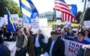 Protest tegen het voornemen van de regering-Trump om het transgenederbeleid terug te draaien, maandag in Washington. beeld EPA, Jim Lo Scalzo