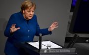 „Meer dan ooit worden van Duitsland wijsheid en evenwichtigheid verwacht. Daarom moet Angela Merkel aan het roer van haar land blijven staan.” beeld AFP, Tobias Schwarz