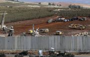 Graven naar tunnels aan grens Israël. beeld AFP, Mahmud Zayyat