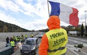 Momenteel berichten de Franse media tamelijk eenzijdig over de demonstraties van de ‘Gele Hesjes’. beeld AFP, Sylvain Thomas