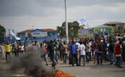 Het conflict in de Democratische Republiek Congo was in 2018 in de media de meest genegeerde crisis. Foto: protesten op 21 januari in de Congolese hoofdstad Kinshasa, na de presidentsverkiezingen. beeld EPA, Hugh Kinsella Cunningham