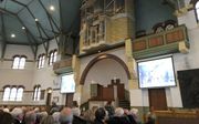 Herdenkingsbijeenkomst in de Oosterkerk in Aalten. Het dorp in de Achterhoek herdacht woensdag voor het eerst de razzia van 75 jaar geleden, toen de SS twee andere kerkgebouwen omsingelde. beeld RD