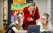 Voor de stichting Méér Muziek in de Klas bezocht koningin Máxima in 2018 een workshop digitaal componeren op de pabo van Hogeschool Leiden. beeld ANP, Patrick van Katwijk
