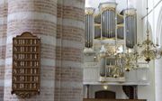 Het is wonderlijk dat God vroeger sprak door de psalmen en dat Hij dat nog steeds doet. Foto: interieur Grote kerk Tholen. beeld RD, Anton Dommerholt