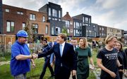 Nieuwbouwwijken kunnen en moeten gasloos. Foto: Koning Willem-Alexander bezoekt de nieuwe duurzame wijk Veemarkt in Utrecht.  beeld ANP, Robin van Lonkhuijsen