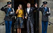 Koning Willem-Alexander en koningin Máxima komen aan voor de nieuwjaarsontvangst van woensdag. beeld ANP