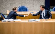 Premier Rutte en minister De Jonge voorafgaand aan het coronadebat. beeld ANP, Bart Maat