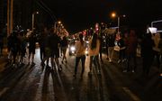 Protesten in de Wit-Russische hoofdstad Minsk, woensdagavond. beeld EPA