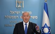 Premier Netanyahu, donderdag. beeld EPA, Abir Sultan
