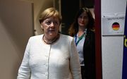 De Duitse bondskanselier Angela Merkel, dinsdagavond in Brussel. beeld AFP