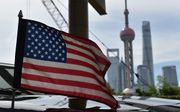 Amerikaanse onderhandelaars proberen in Shanghai een uitweg uit de slepende handelsoorlog met China te vinden. beeld AFP